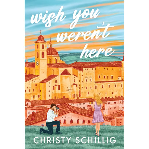 Book cover of 'Wish You Weren't Here' by Christy Schilling with a couple in an Italian town illustration.
